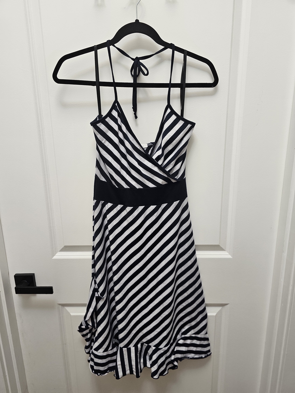 Flirty black and white striped midi dress.